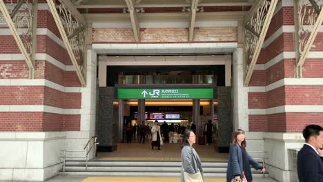 People-leave-the-Marunouchi-north-entrance-exit-of-Tokyo-Station