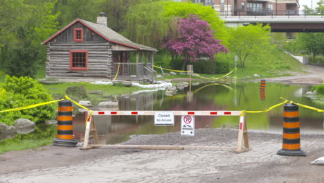 Road-Closed-barrier-put-up-after-spring-flooding-covers-a-road