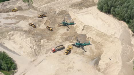 Drone-flight-over-a-bulldozer-in-the-open-cast-mine