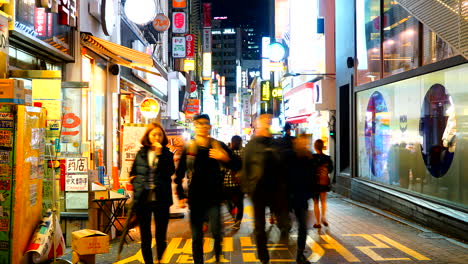 Seoul-South-Korea---Circa-Time-lapse-pan-shot-of-Myeongdong-Market-in-Seoul,-South-Korea,-busy-illuminated-night-market-atmosphere