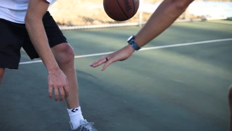 Two-men-playing-1v1-Basketball-on-an-Outdoor-Basketball-Court-in-Hawaii