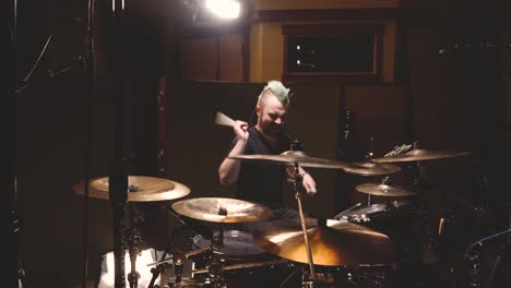 Drummer-performing-in-a-studio-setting