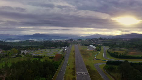 Amazing-drone-landscape-shot-over-an-empty-racing-track---aerodrome