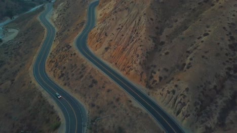 Flying-over-this-curved-road-called-Grimes-Canyon-in-Moorpark,-CA