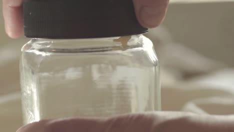 Opening-a-glass-jar
