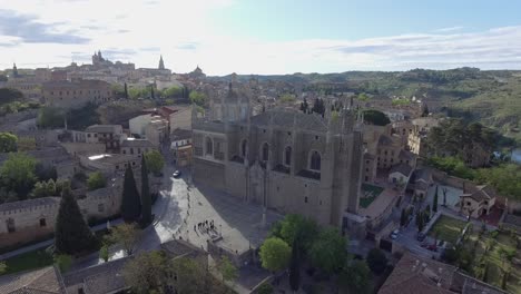 Aerial-video-of-the-Monastery-of-San-Juan-de-los-Reyes-and-views-of-Toledo,-Spain