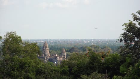 Wide-Shot-of-Angkor-Wat-Behind-the-Trees