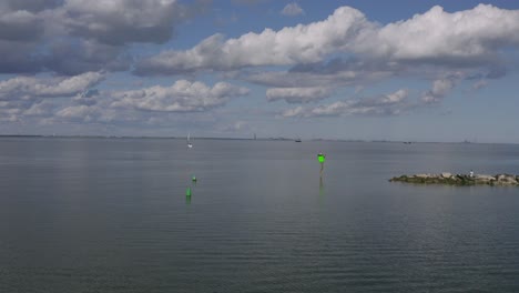 Droning-towards-a-sailboat-in-a-peaceful-bay-in-Texas