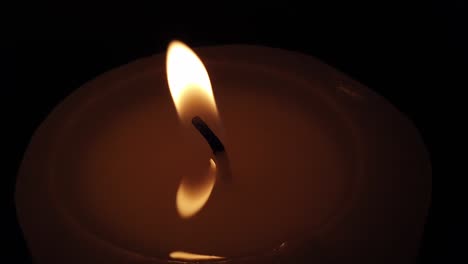 Zooming-out-to-hope,-light,-candle,-faith