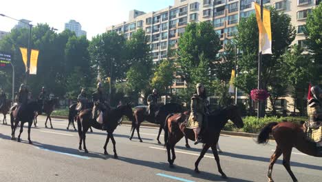 Ancient-cavalry-march-in-parade-at-Hanseong-Baekje-festival,-Jamsil-dong,-Songpa-gu,-Seoul,-South-Korea