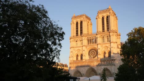 View-of-the-famous-Notre-Dame-Cathedral-at-sunset-–-Paris,-France