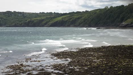 Waves-Gently-Crashing-Onto-Laxey-Beach,-Isle-Of-Man