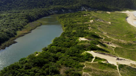 Aerial-view-of-Lagoinha-Do-Leste-beach-lake,-Florianopolis,-Santa-Catarina,-Brazil