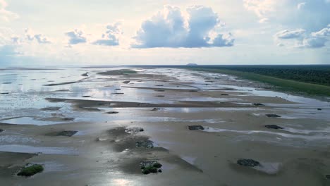 Aerial-fly-over-the-Tonle-Sap-lake-edge-during-rainy-season,-showing-the-low-water-table