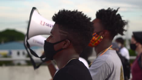 Young-black-male-marching-at-Black-Lives-Matter-protest,-close-up