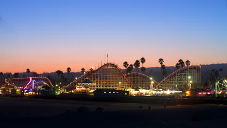 Timelapse-of-Santa-Cruz-Beach-Boardwalk-Amusement-Park-as-Evening-Sets-in