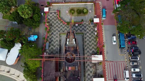 Aerial-top-down-shot-of-giant-sailing-boat-from-the-asian-war-monument-in-Melaka-city