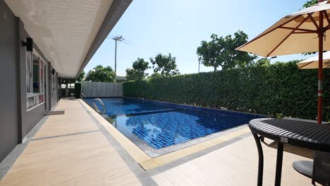 Peaceful-and-Sunny-Swimming-Pool-Area