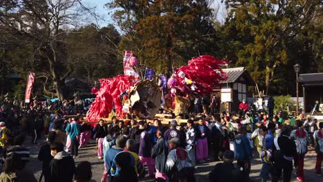 Sagicho-Matsuri-floats-being-carried-through-Omihachiman,-Shiga