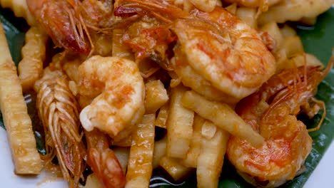 Close-up-Footage-of-Stir-Fried-Prawn-and-Young-Coconut-Shoot,-One-of-Thai-Comfort-Food