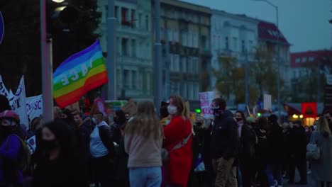 Crowd-Of-People-On-The-Street-With-Banners-And-Pace-Rainbow-Flag---Peaceful-Demonstration-Against-Abortion-Ban-In-Szczecin,-Poland---medium-shot
