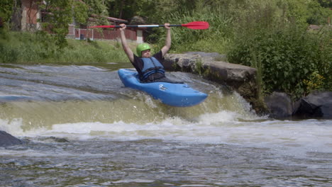 Kayaker-man-enjoying-river-rapids,-extreme-sport,-slow-motion