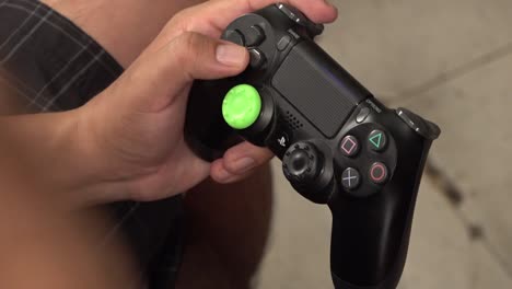 Hands-of-a-gamer-on-a-gamepad-controller