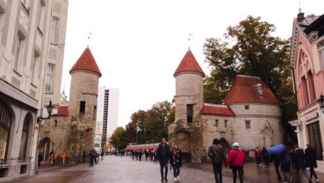 Twin-towers-of-Viru-Gate-in-the-old-town-of-Tallinn,-Estonia