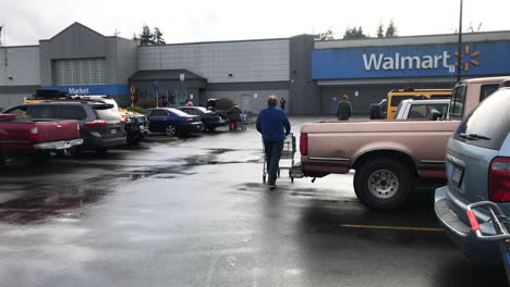 Customers-Walking-From-The-Parking-Area-In-Front-Of-Walmart-Coos-Bay-In-Oregon