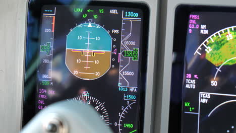 Close-Up-Airliner-Aircraft-Cockpit-PFD-Instruments-in-Flight