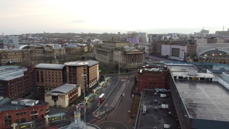 Aerial-view-across-iconic-Liverpool-city-skyline-empty-streets-during-corona-virus-pandemic-St-Georges-hall-Lime-st-station