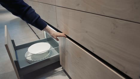 A-wood-kitchen-showroom-gimbal-shots-of-drawers-being-opened