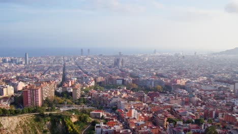 Sweeping-panoramic-view-of-the-City-of-Barcelona-seen-from-Bunkers-Del-Carmen