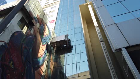 Fensterreinigungs--Und-Waschteam-Für-Wolkenkratzer,-Das-In-Der-Innenstadt-Von-Hongkong-Tätig-Ist