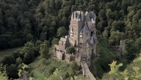 Burg-Eltz-fairytale-castle-in-forest,-static-shot-of-top-german-tourist-attraction
