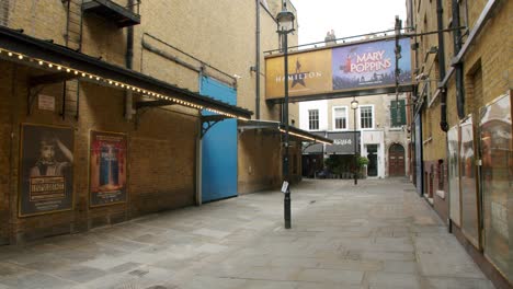 Lockdown-in-London,-gimbal-pan-reveal-of-deserted-West-End-streets-and-closed-Theatres,-during-the-COVID-19-2020-pandemic