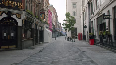 Lockdown-in-London,-slow-motion-gimbal-pan-of-empty-Kingly-Street,-Soho,-with-no-people,-during-the-COVID-19-pandemic-2020
