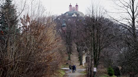 Walking-trail-path-near-church-in-the-city-of-Banska-Stiavnica,-Slovakia