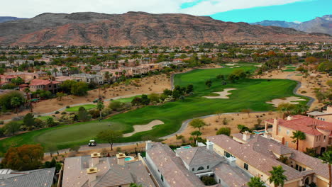 Aerial-View-of-Golf-Course-Southwestern-Suburbs-with-Mountains-in-Background-near-Red-Rock