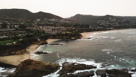 Flying-over-the-sea-at-Laguna-Beach-at-afternoon