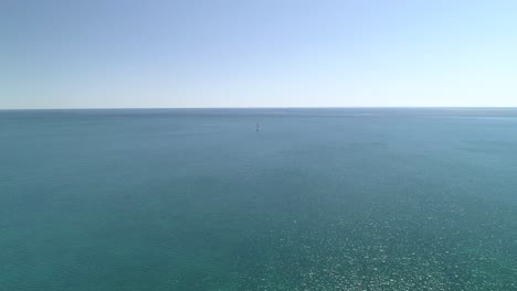 Nothing-but-the-clear-blue-ocean-and-a-sail-boat
