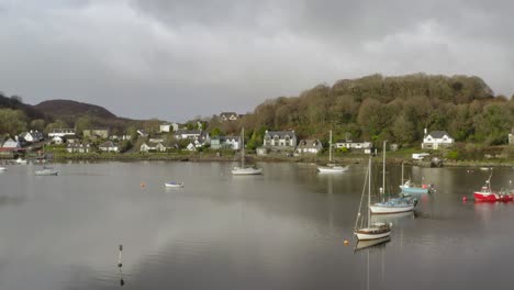 An-aerial-view-of-the-harbour-village-of-Tayvallich-on-an-overcast-day-in-Argyll-and-Bute,-Scotland
