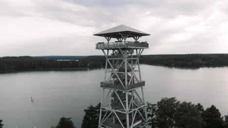 Aerial-shot-of-Wdzydzki-Park-Krajobrazowy-in-Kaszuby,-Poland-with-view-of-observation-tower-in-Wdzydze-Kiszewskie