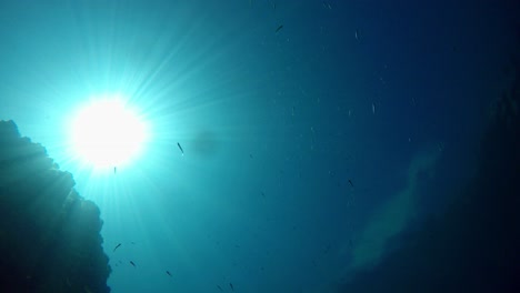 Sun-shot-from-bottom-of-a-lake-with-clear-and-transparent-blue-water