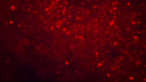 Abstract-dark-crimson-red-sparkly-particle-background-with-shiny-bokeh-lights-LOOP