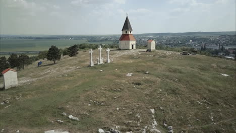 Aerial-shot-of-Calvary-Chapel-on-Hill-in-Nitra-on-sunny-day,-Slovakia