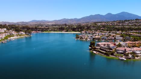 Aerial-fly-down-the-middle-of-community-lake-mission-viejo