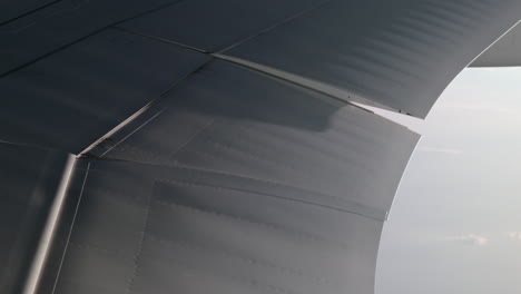 Inboard-aileron-moving-on-airplane-wing-inflight-correction