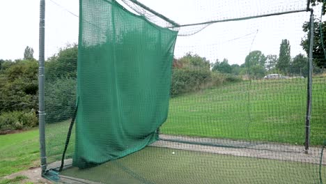 Slow-motion-shot-of-a-player-practicing-in-the-net