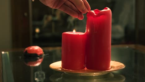 Man-lighting-candles